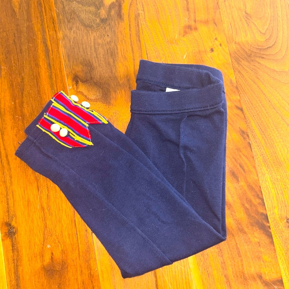 Ponte knit navy blue leggings with red yellow and pearl cuff